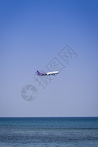 飞机飞越海面空气航空假期班轮自由运输气氛海洋翅膀乘客图片