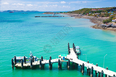 桥码头海浪热带旅行季节木头风景反射旅游房子阳光图片