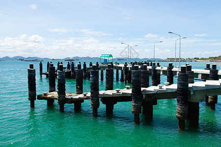 桥码头天空天堂小路反射木头房子场景旅游地平线海浪图片