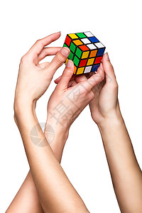 手握颜色立方体技巧游戏解决方案字谜魔方正方形战略玩具头脑商业图片