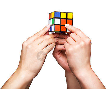 手握颜色立方体魔方游戏字谜科学物流逻辑玩具战略技巧想像力图片