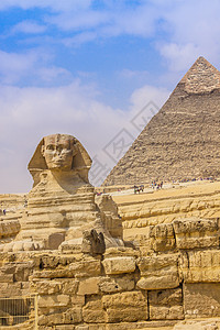 斯芬克斯和埃及伟大的金字塔人面雕像旅行建筑学假期天空上帝石头狮身文明图片