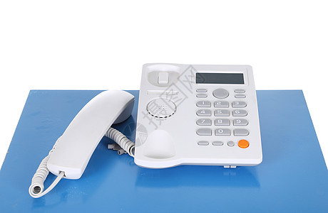 电话在一张桌子上商业酒店电缆办公室按钮技术听筒白色会议木头图片