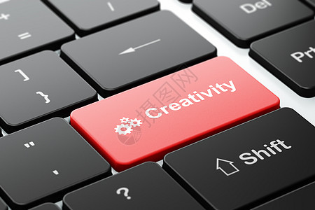 营销概念 计算机键盘背景上的齿轮和创造性图片