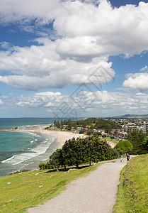 环绕位于新西兰陶朗加的山峰女士海滩风景血统海洋跑步游轮母亲赛跑者顶峰图片