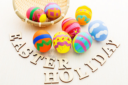 配木字的彩色设计方形鸡蛋绿色节日传统团体木头亚麻柳条孩子庆典艺术图片