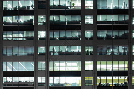 夜间办公大楼玻璃商业摩天大楼建筑学市中心金融财产城市蓝色天空图片