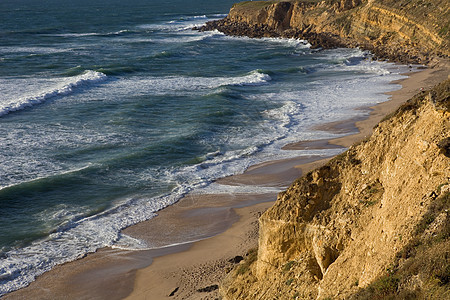 海滩沙滩反射旅游海景风景岩石蓝色旅行国家环境太阳图片