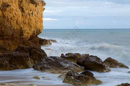 长期接触运动岩石公园蓝色海岸环境橙子海滩海洋气候图片