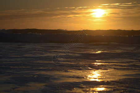 日落下的海海浪天堂天际海岸线蓝色天空橙子海岸泡沫海洋图片