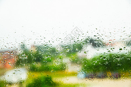 雨哒哒波纹窗户流动玻璃液体水分天气环境水滴雨滴图片