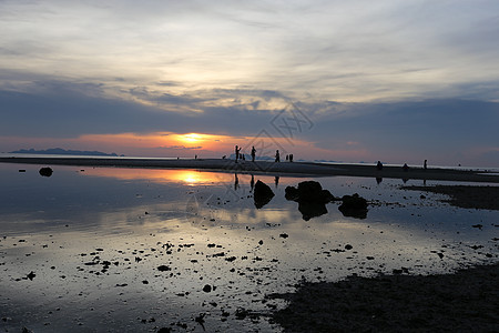 海面日落魔法海滩蓝色海洋海岸线晴天阳光地平线天堂海岸图片