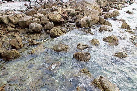 岩石水侵蚀天空运动力量冲浪风暴天气海景地平线旅行海浪图片