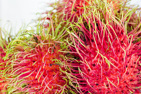 白色背景上的拉布丹营养饮食情调美食热带果园水果植物异国红色图片