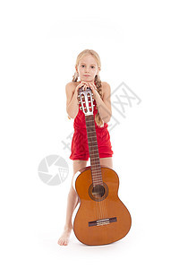 吉他手的年轻站立女孩图片
