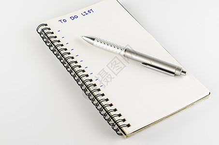 有笔笔写作用于列出单词的笔记本商业备忘录文档笔记螺旋记事本教育日记床单小路图片