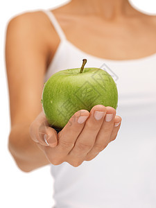 女性用绿苹果手营养食物饮食活力维生素水果早餐手臂手掌节食图片