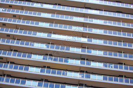 现代建筑的外面玻璃城市蓝色成功摩天大楼商业建造办公室技术公寓图片