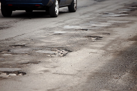 坑洞损害城市街道破坏基础设施跑步状况运输质量衰变图片