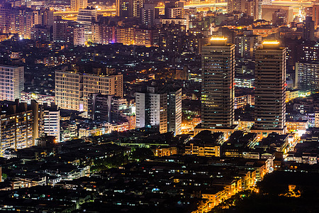 台湾101大楼现代城市之夜 有摩天大楼和轻型汽车房子公寓建造地标办公室天际建筑辉光景观商业背景