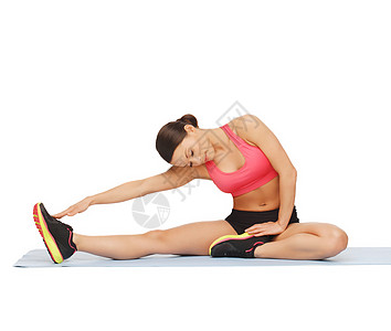 在地板上做运动的女运动员有氧运动培训师身体教练训练女性运动装讲师瑜伽腹肌图片