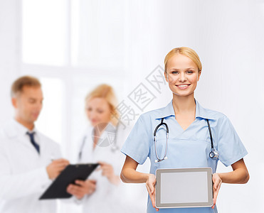配有平板电脑的女医生或护士诊断保健屏幕学生团体诊所药品医院团队卫生图片
