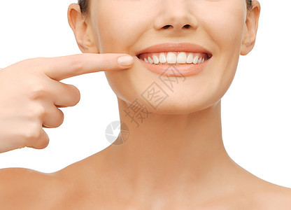 指着牙齿的美丽的女人卫生女性女孩手指矫正呼吸嘴唇福利微笑治疗图片