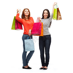 2个带着购物袋笑着的少女女孩零售幸福财富礼物快乐销售顾客购物狂奢华提倡者图片