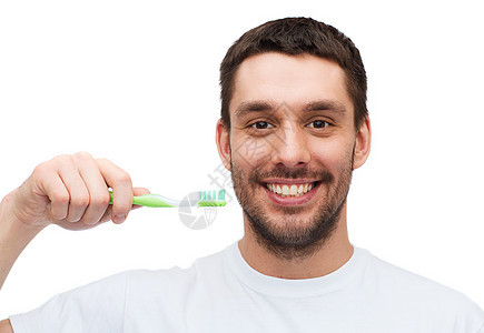 带着牙刷微笑的年轻人擦洗牙科保健塑料增白剂福利口服拉丁成人牙齿图片