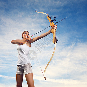 女人用弓箭操练动机健身力量生活方式魅力女士女性训练专注活动图片
