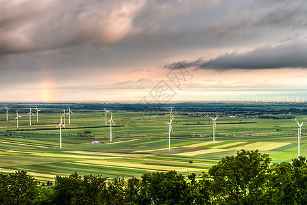 风车的风景旋转天空建设发电机环境空气日落场地力量技术图片
