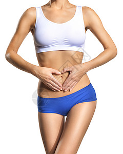 白色背景的合身妇女重量腹部组织身体女性测量皮肤饮食运动美丽图片
