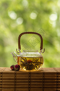 透明茶壶 盛开花茶花图片