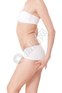 身穿内衣的身材苗条的女人力量冒充臀部调子身体饮食白色营养数字重量图片