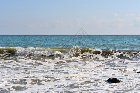 海浪在岸上滚滚天堂海岸太阳蓝色海岸线季节晴天海景支撑场景图片