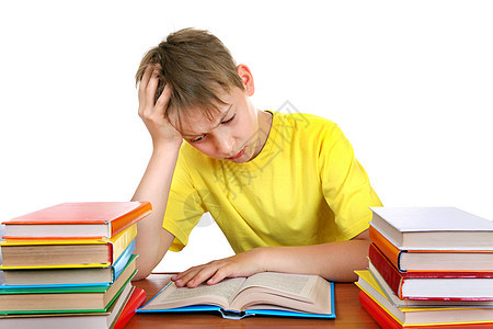 疲累的在校男孩沉思倦怠教科书图书家庭教育孩子课堂班级失败图片