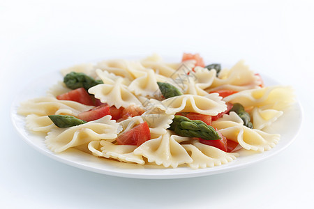 Farfalle 番茄和阿斯帕拉古沙拉桌子沙拉食物美味美食草本植物午餐盘子蔬菜玻璃图片