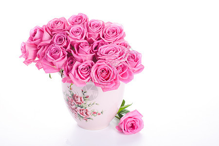 花瓶中的粉红玫瑰图片