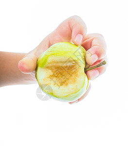 幼童手握着未成熟的绿苹果向白孩子童年男生指甲工作室水果营养手指食物服务图片