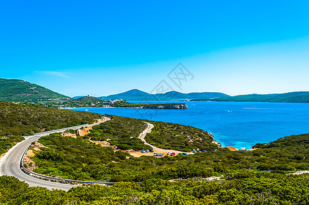 撒丁岛海岸景观地平线风景晴天假期冲浪阳光日落海洋海景支撑图片