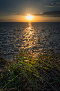 日落海景旅游墙纸海岸反射太阳晴天海洋帆船场景蓝色图片