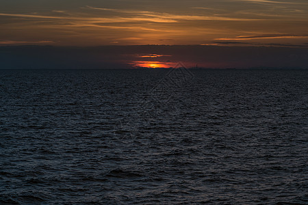 日落海景地平线反射假期旅行橙子墙纸支撑帆船天空海岸图片