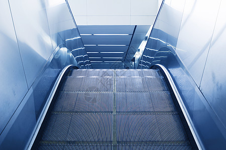 地铁站扶梯购物中心蓝色脚步行人火车楼梯运输车站办公室运动图片