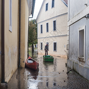 洪水泛滥的街道倾盆大雨村庄损害建筑环境城市天气悲剧情况损失图片