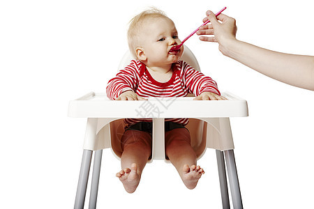母乳喂养婴儿人类晚餐影棚桌子母亲食品棕榈快乐身体勺子图片