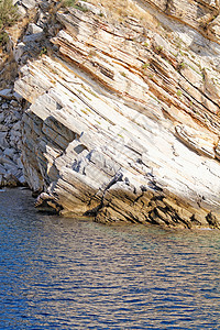 海洋中的岩石风景天堂反射热带蓝色假期海景海岸闲暇海滩图片