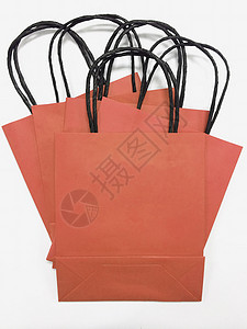 红色纸袋纸袋购物红色折扣派对礼物彩色零售展示顾客销售量背景