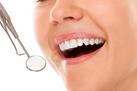 笑着看牙医临床程序治疗矫正愈合乐器镜子诊所嘴唇衰变图片