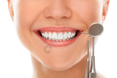 笑着看牙医药品治愈乐器衰变嘴唇愈合治疗镜子病人牙齿图片