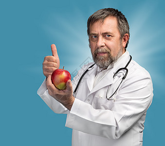 医生建议苹果用于健康饮食药品外套福利疾病护士男人食物处方水果实验室图片
